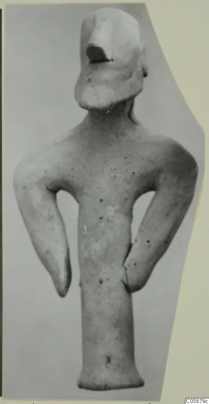 Terracotta figurine of a standing figure with arms bent at its sides, from Idalion