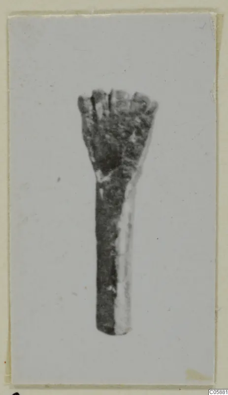 Bronze spatula-type toilet implement with a flared, notched end, from Idalion