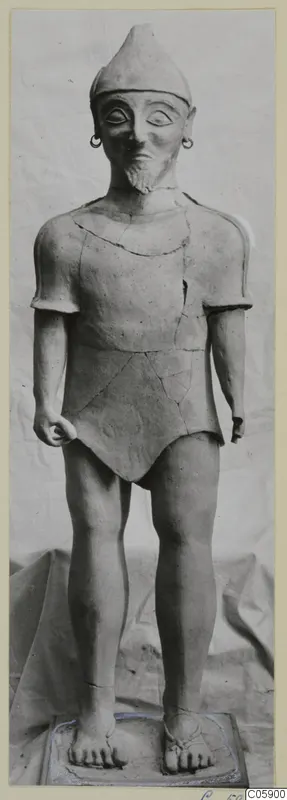 Terracotta statue of a standing male figure in a conical cap, Terracotta Proto-Cypriote I