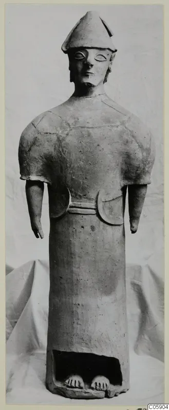 Terracotta statue of a standing figure with a conical cap and short outstretched arms, Proto-Cypriote I