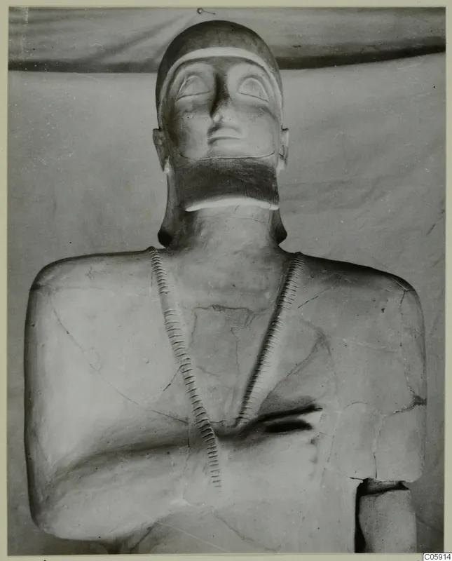Terracotta statue from Ayia Irini, head and upper body with incised bands across the chest