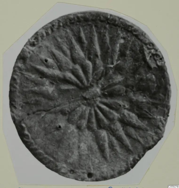 Round metal disc with radiating ridges around a central boss, Idalion bronze find
