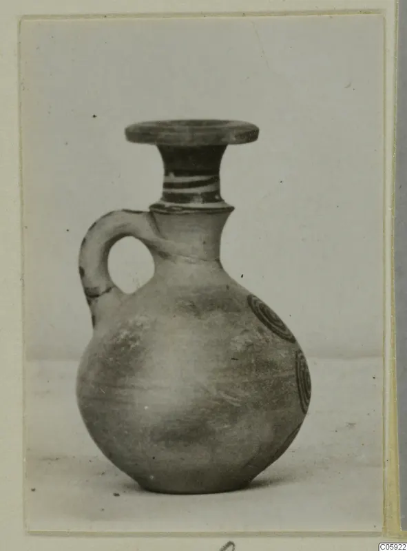 Pottery Bichrome IV, Plate - Jug: small jug with a flat-topped mouth, banded neck and concentric circle motifs on the body