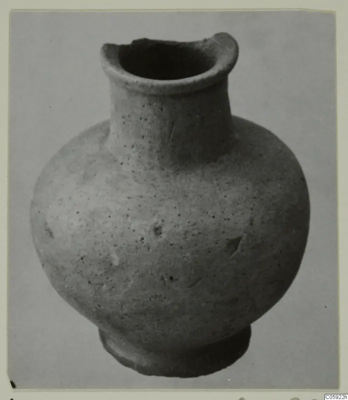 Hand-made pottery vessel with a flared neck and ring base, from Idalion.