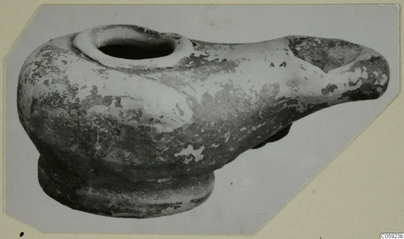 Terracotta lamp from Idalion with a round filling hole and a long nozzle