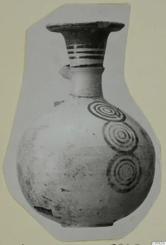 Pottery Bichrome IV jug with concentric circle motifs and painted neck bands, from Idalion