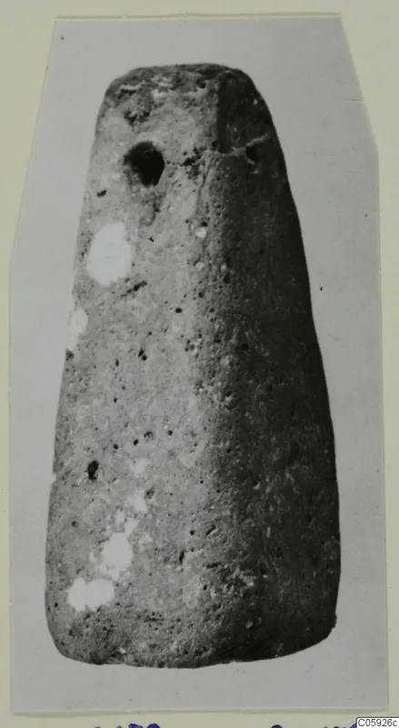 Tapered stone object with a round hole near its top, from Idalion.