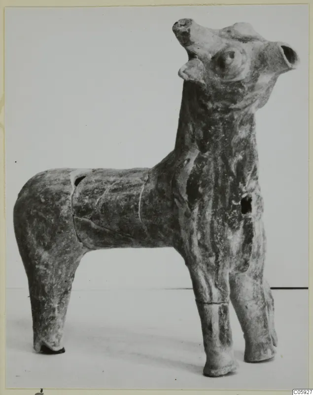 Terracotta figurine of a standing four-legged animal with its head raised and ears upright, from Ayia Irini