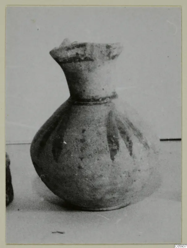 Pottery Bichrome V vessel with a flared rim, narrow neck and dark painted bands, from Idalion