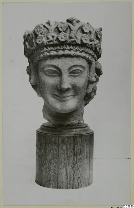 Limestone sculpted head of a woman wearing a leafy crown, from Vouni.