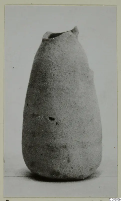 Pottery Plain White IV-V vessel with a narrow mouth, tapering body and rounded base