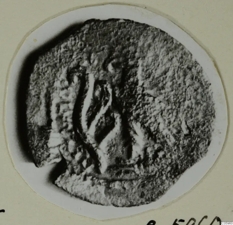 Round find with a raised pattern, from Idalion.