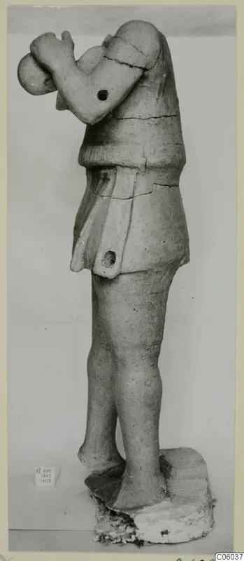 Terracotta standing figure, Terracotta Proto-Cypriote I, side view on a plinth, one arm raised toward the head
