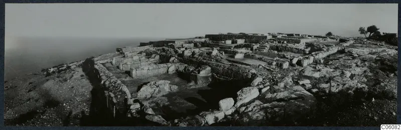 Excavated remains of the palace at Vouni on a hilltop, with the sea hazy at the left edge