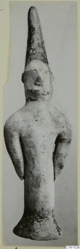 Terracotta figurine of a standing human figure with a tall conical head and arms held at the sides