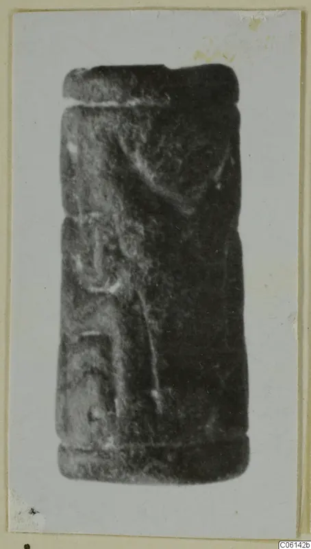 Cylindrical stone seal from Ayia Irini, shown upright on a card mount