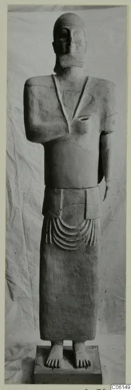 Terracotta statue of a standing figure from the Neo-Cypriote series, shown full length on a rectangular base