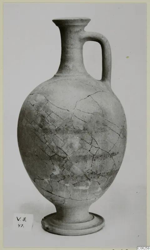 Pottery jug with a single loop handle and ring foot, White Painted VII from Vouni