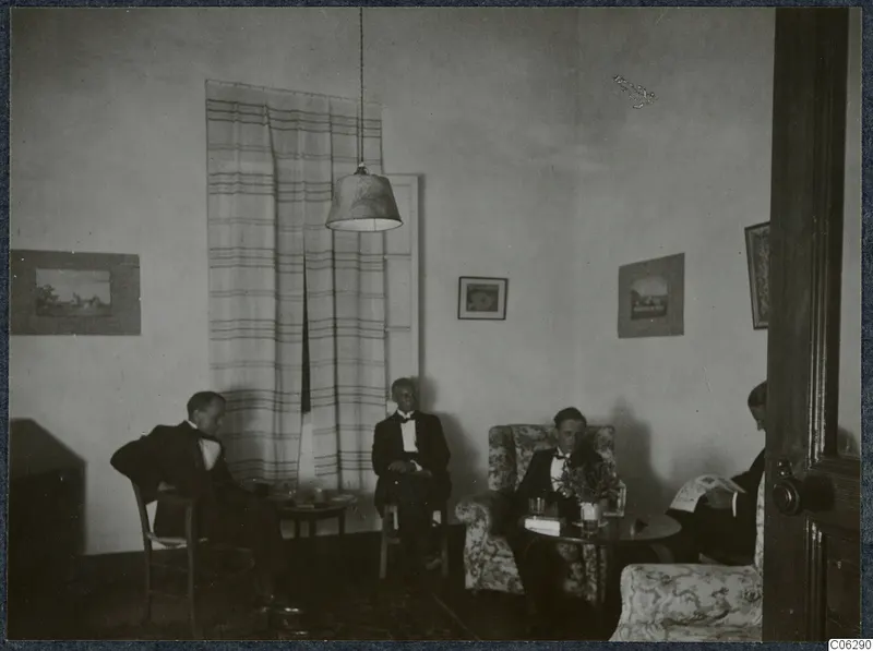 Four men in dark suits seated in a room in Nicosia, 1931
