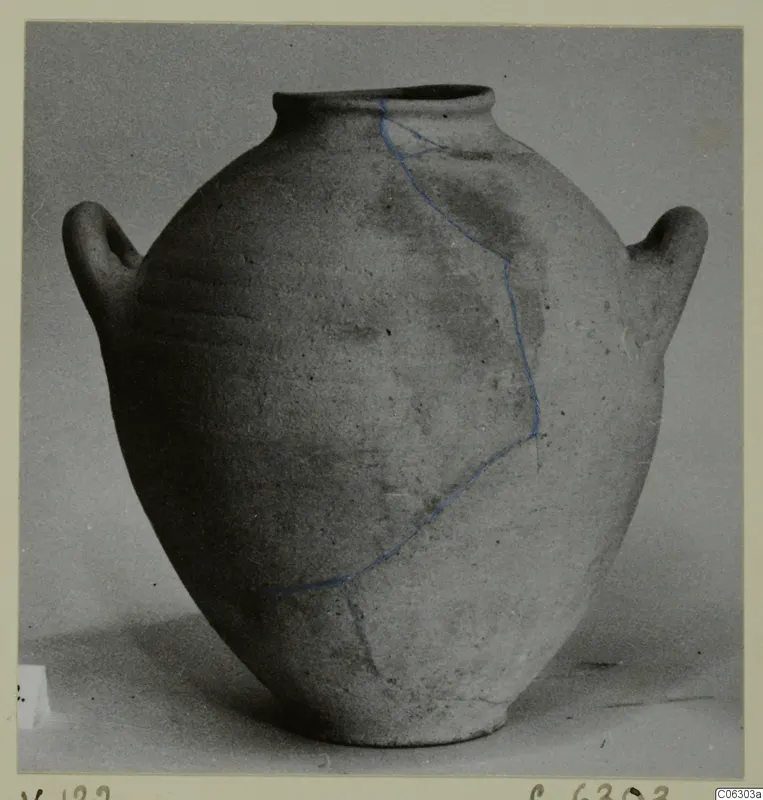Pottery Plain White VI jar with two side handles, its mended cracks marked in blue
