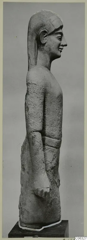 Limestone Cypro-Greek I statue from Kition, shown in profile