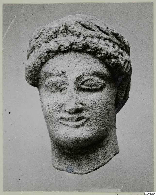 Limestone sculpture of a head from Kition, front view