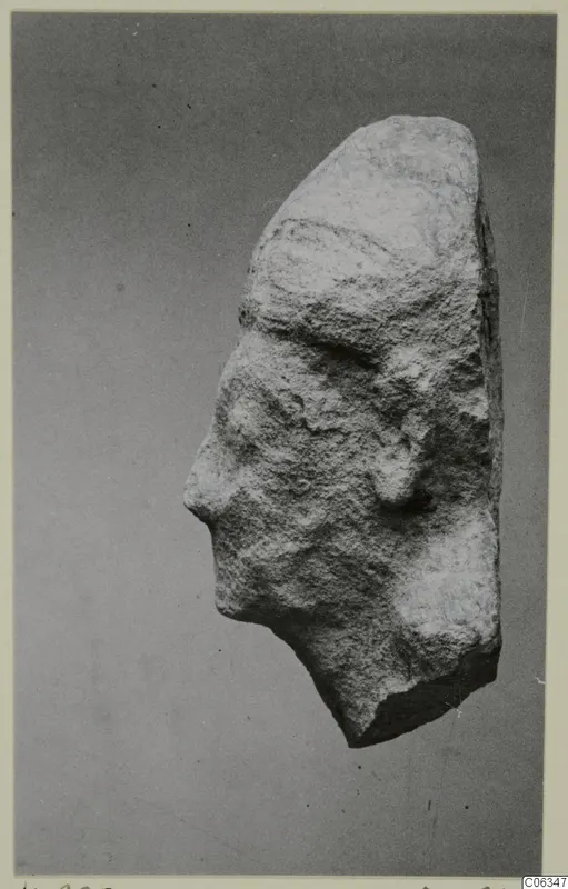 Limestone head fragment in profile, facing left, from Kition.