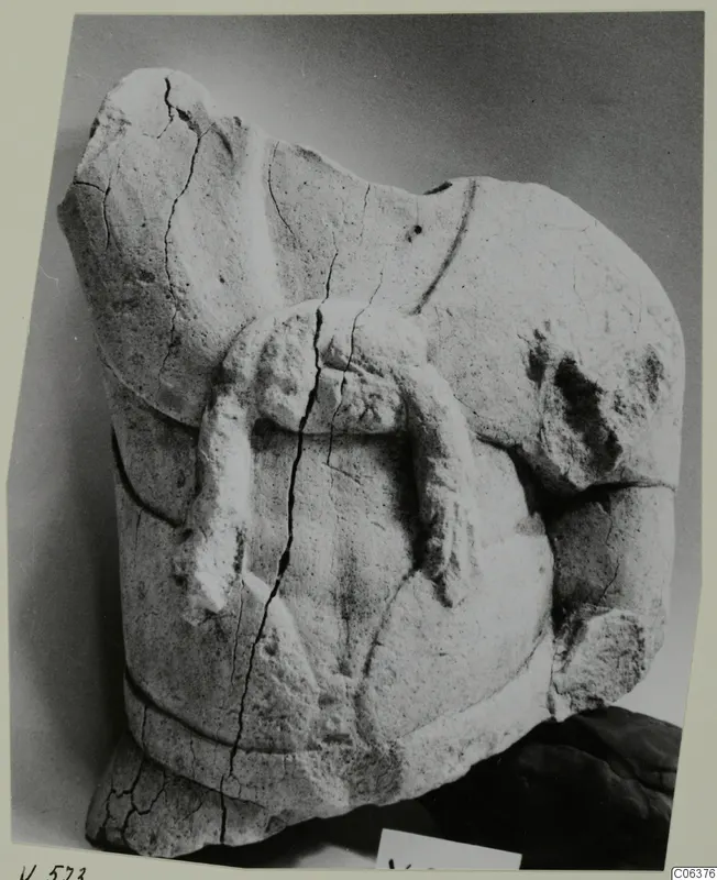 Limestone sculpture fragment from Vouni with a bent projecting limb on a rounded body