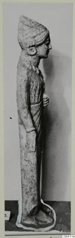 Limestone statue of a standing figure in profile, from Vouni