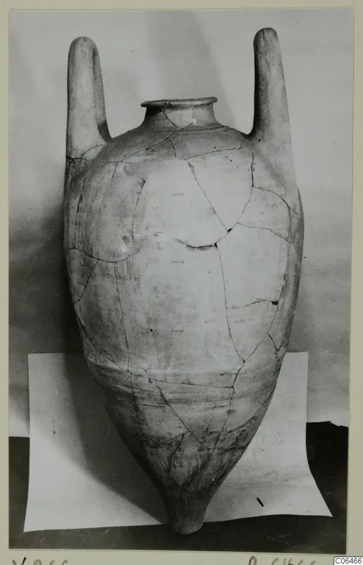 Pottery Plain White VI pithos with two tall handles, reconstructed from sherds, photographed on white paper.
