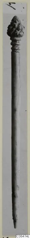Long pin with a knobbed head and a tapering point