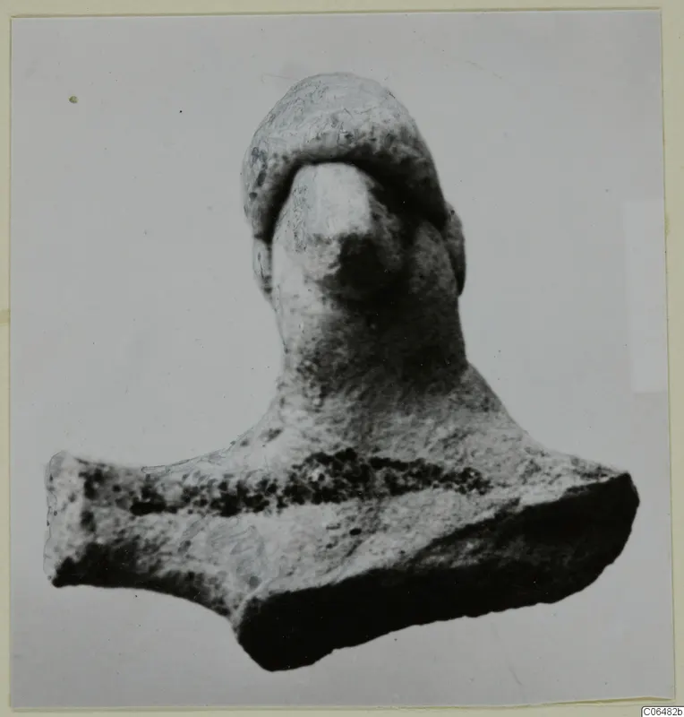 Terracotta figurine fragment from Vouni: head, neck and broad shoulders with a dark painted band