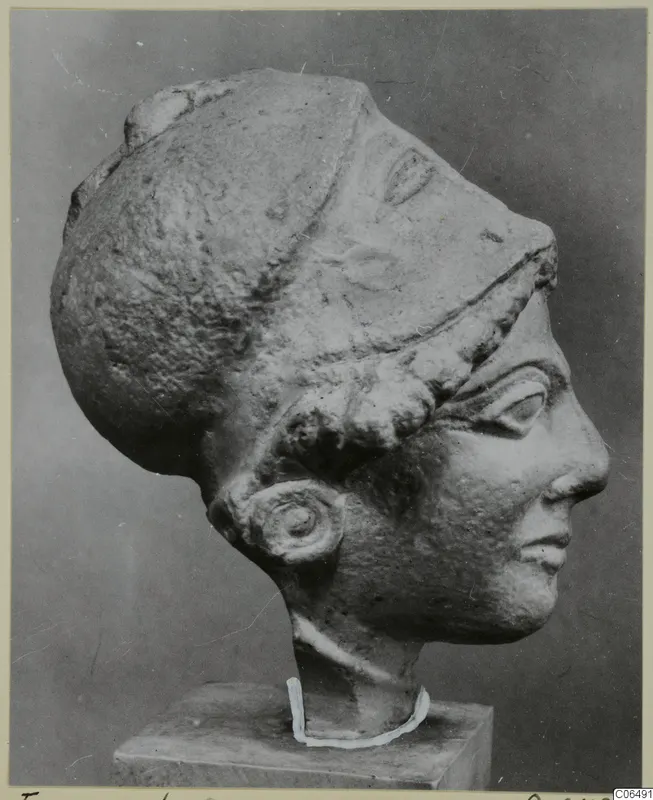 Limestone head from Vouni in profile on a square base, shown from a cast
