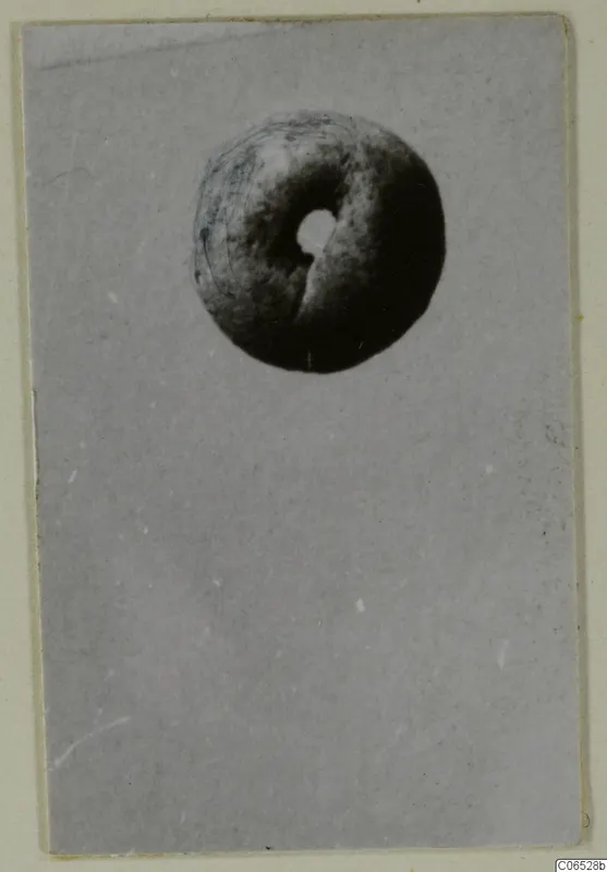 Ring-shaped object with a central hole, photographed from above, from Vouni