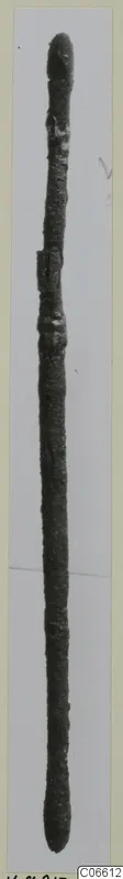 Long corroded bronze rod with a rounded knob at each end and a swelling near the top, a toilet requisite from Vouni.