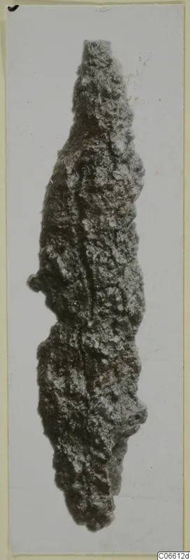 Corroded iron arrowhead from Vouni, photographed upright