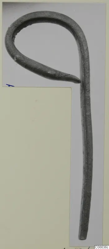 Bronze utensil handle bent into a loop at one end, from Vouni