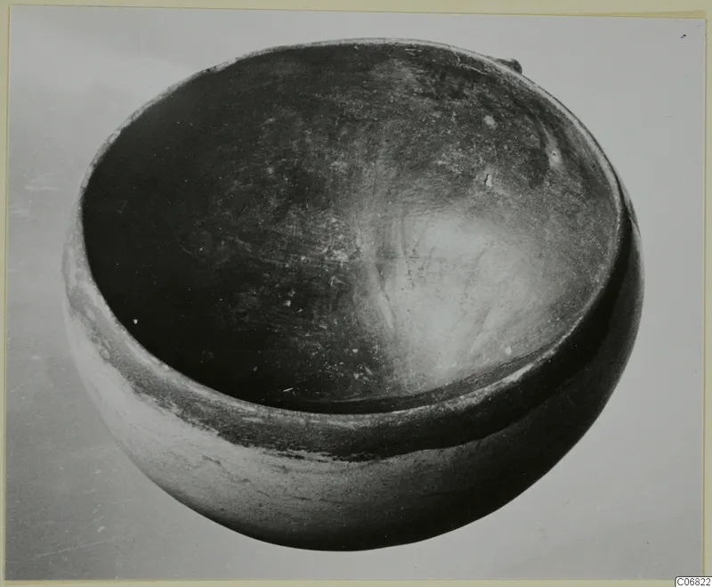 Red Polished II bowl from the Vrysi tou Barba tombs at Lapithos, seen from above at an angle