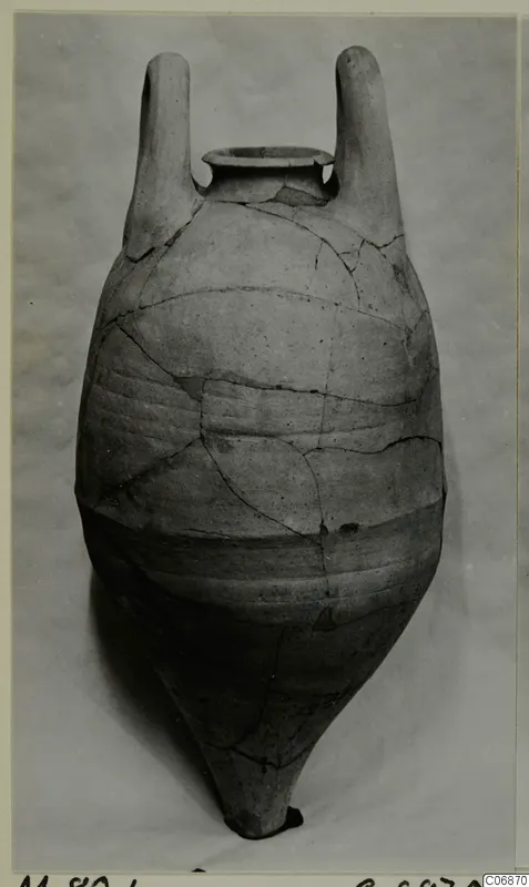 Pottery Plain White IV-V pithos from Marion, with two tall loop handles and a pointed base
