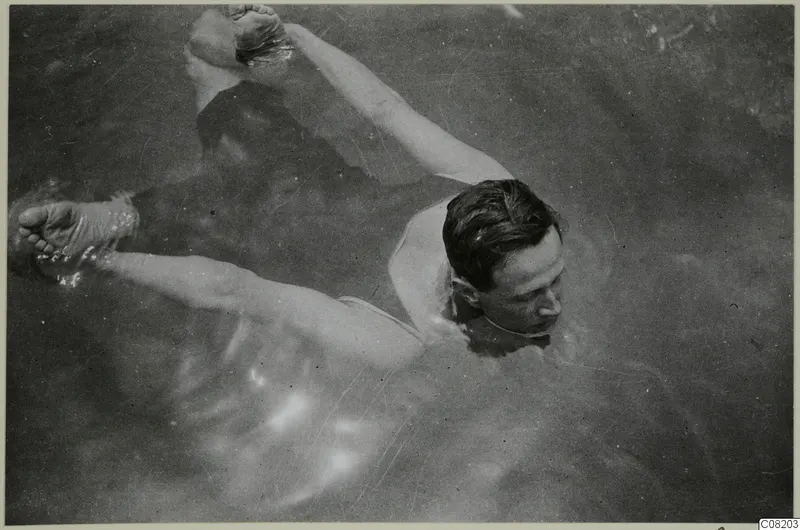 Einar Gjerstad swimming in water at Kyrenia, seen from above