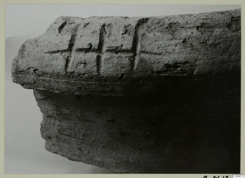 Close view of a pottery fragment with incised signs on its upper surface, Pottery Pithos Ware