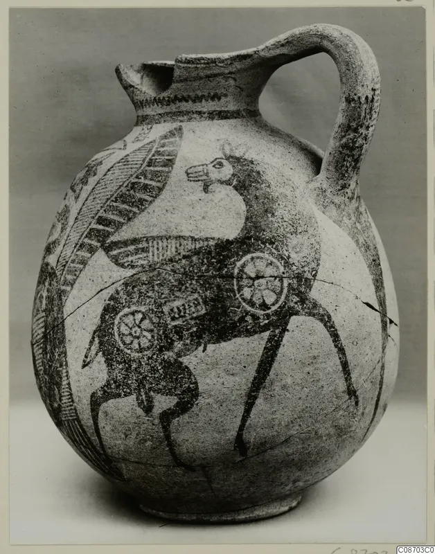 Painted jug with a strap handle, decorated with a long-legged animal and rosette motifs