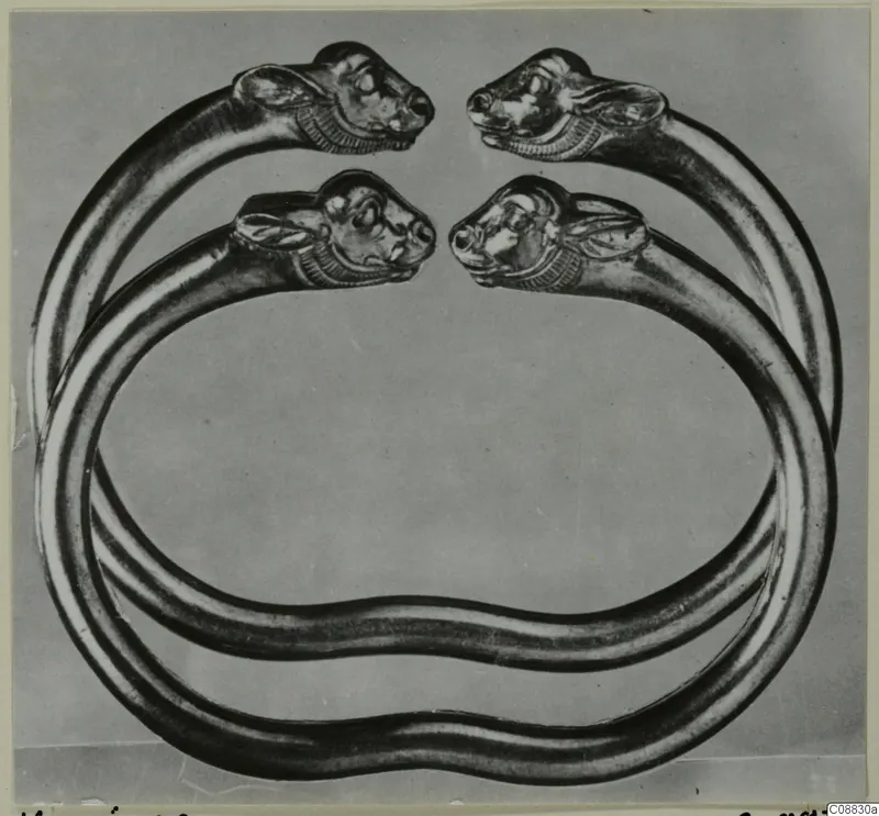 Two gold bangles with animal-head terminals, from Vouni