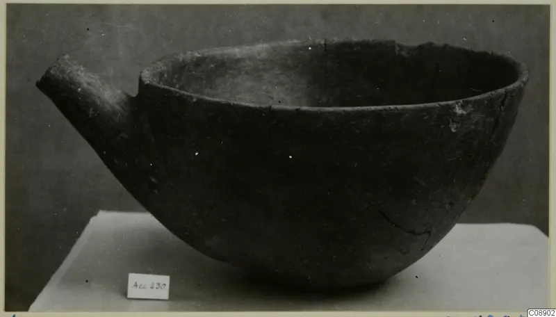 Red Polished I pottery vessel with a short side spout and a wide open mouth