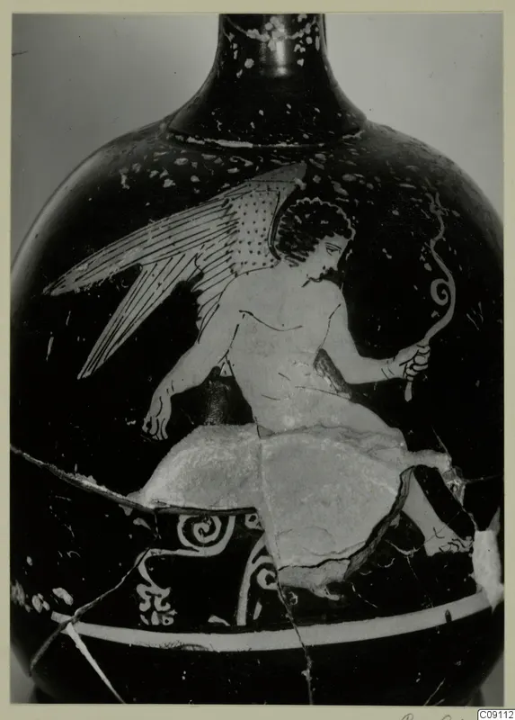 Large black-glazed vessel with a winged figure seated in reserved colour, holding a curling staff in one hand
