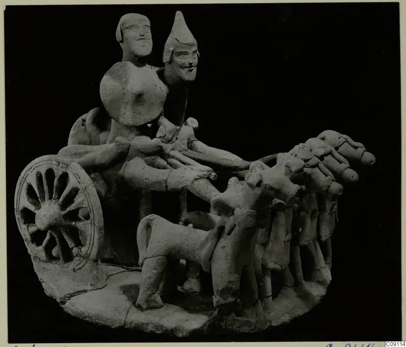 Terracotta model of a chariot with two figures and a team of horses, from Ayia Irini