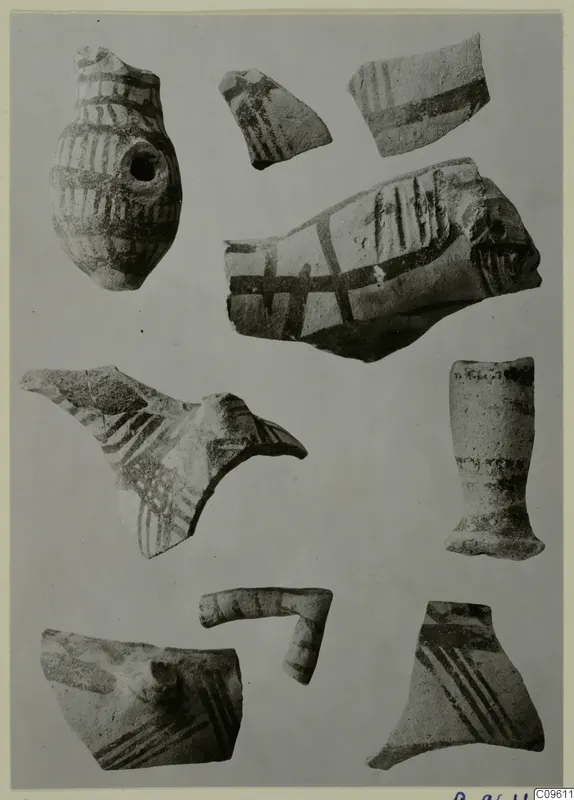 Lev. Hell. sherds: several painted pottery fragments, including a small jug with a pierced lug, laid out on a grey ground