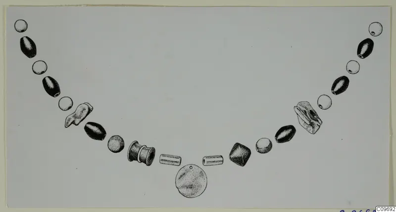 Field drawing of a necklace of beads and a round pendant, laid out in a curve across a pale card