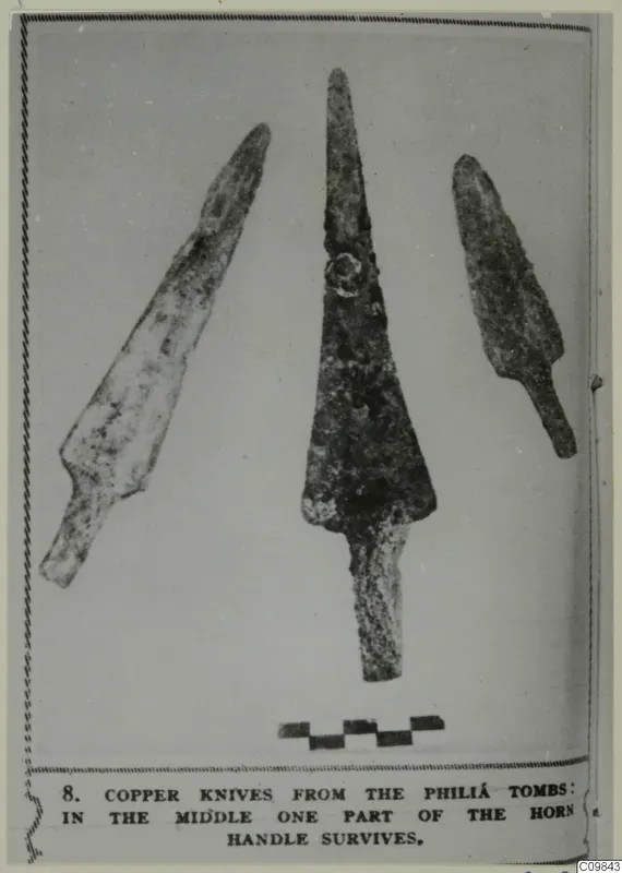 Three metal knives with tapering blades and tangs, shown beside a chequered scale bar.