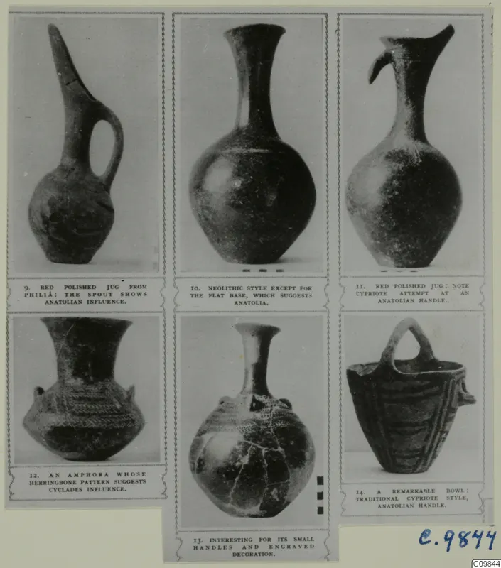 Mounted page of photographs of pottery vessels, including jugs, an amphora and a bowl, each with a printed caption